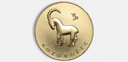 Darček pre znamenie Kozorožec - ligotavá minca pre šťastie.